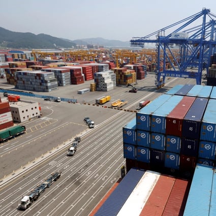 Trucks used to transport containers are seen at the Hanjin Shipping container terminal at the Busan New Port in Busan, South Korea. Photo: Reuters