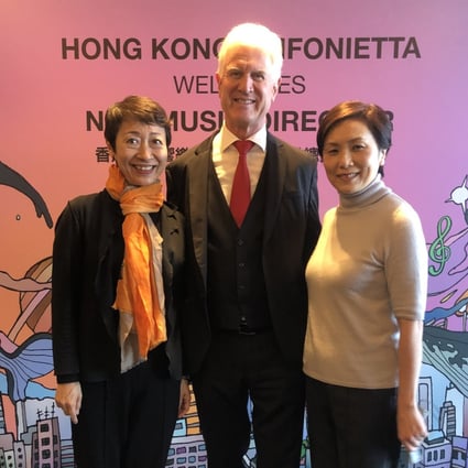 Margaret Yang (left), chief executive of the Hong Kong Sinfonietta, Christoph Poppen, music director from the 2023/24 season, and Yip Wing-sie, music director emeritus at the announcement of Poppen’s appointment on February 1. Photo: Enid Tsui