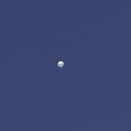 A balloon floats over Columbia, Montana, on Friday. Photo: Missourian via AP