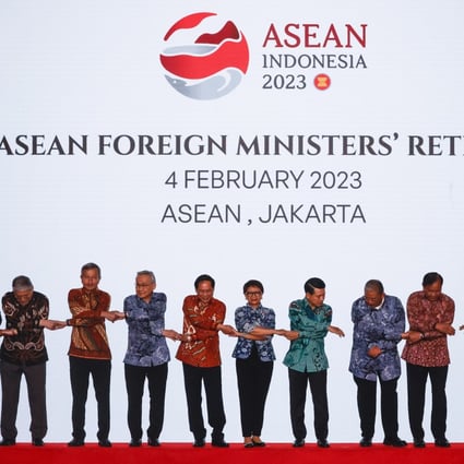 Indonesian Foreign Minister Retno Marsudi (centre) joins hands with her counterparts from across Southeast Asia during Asean meetings in Jakarta on Saturday. Photo: EPA-EFE