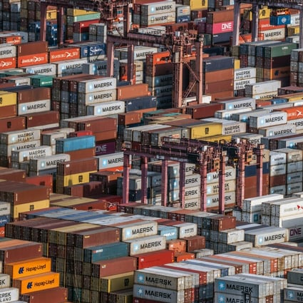 Shipping containers and gantry cranes are pictured at the Kwai Tsing Container Terminal in Hong Kong on March 14, 2022. Photo: Bloomberg