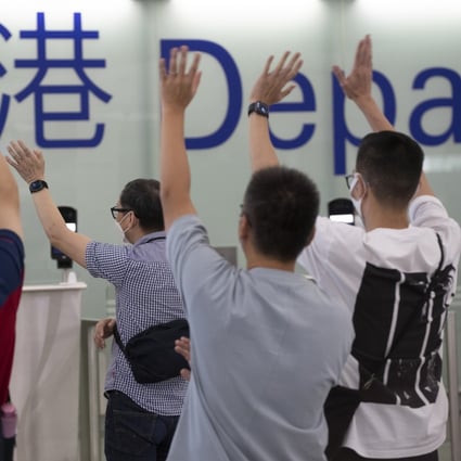 Friends and family wave goodbye to travellers at the Hong Kong International Airport. Photo: Robert Ng