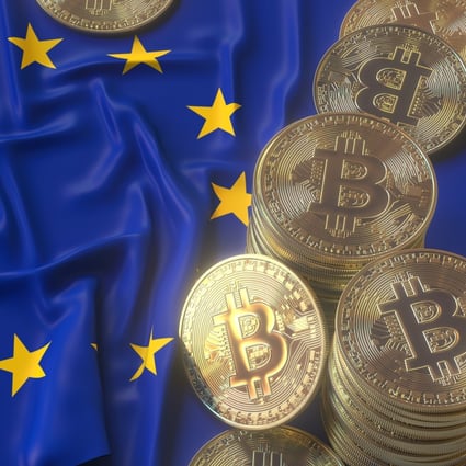 Representations of bitcoin tokens shown on top of a European Union flag. Photo: Shutterstock