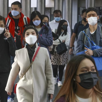 Hong Kong extends mask mandate to March 8, expert cites influenza risk 2 Hongkongers in masks in Central. Photo: Jonathan Wong