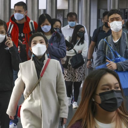 Hongkongers in masks in Central. Photo: Jonathan Wong
