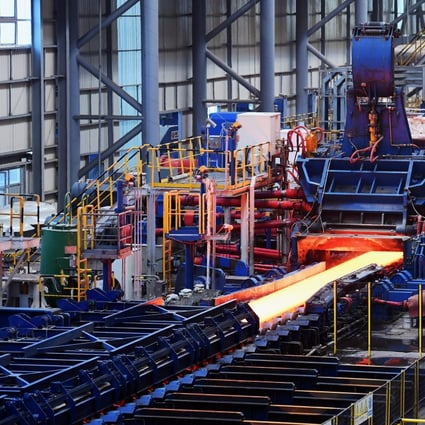 A rolling mill of a Tangsteel plant under the Hebei Iron and Steel Group in Laoting county in north China’s Hebei province in September last year. Steelmaking contributes around 17 per cent of China’s annual emissions. Photo: Xinhua