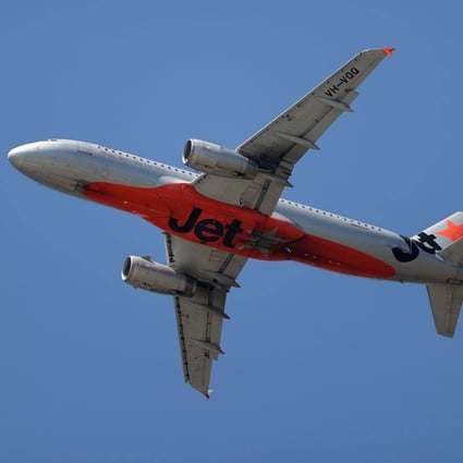 An Airbus SE A320-232 aircraft operated by Jetstar Airways takes off from Sydney Airport earlier this month. Photo: Bloomberg