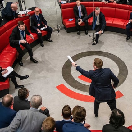 Traders, brokers and clerks on the trading floor of the open outcry pit at the London Metal Exchange in London in February 2022. Photo: Bloomberg