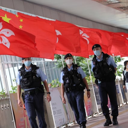 A top Beijing official has urged Hong Kong’s John Lee to handle national security risks by “nipping them in the bud”. Photo: Jelly Tse