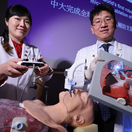 Dr Rainbow Lau Wing-hung (left) and Professor Calvin Ng Sze-hang explain the Chinese University of Hong Kong’s new procedure for cancer patients. Photo: May Tse