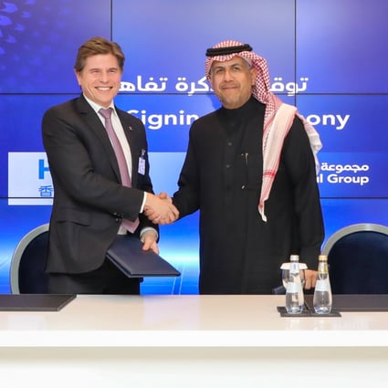 HKEX CEO Nicolas Aguzin (left) and Saudi Tadawul Group CEO Khalid Al Hussan shake hands during the Hong Kong delegation’s visit to Saudi Arabia on February 5. Hong Kong is reaching out globally to promote its role as an IPO hub as other exchanges start to challenge its dominant position. Photo: HKEX