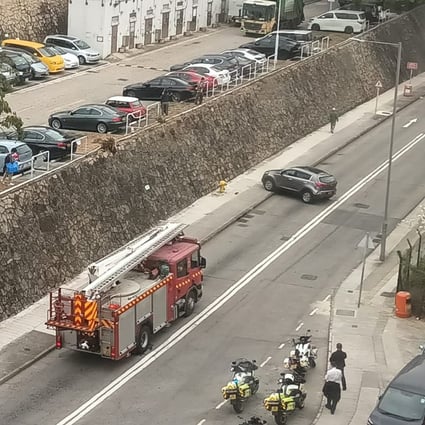 2 injured in Hong Kong after vehicle drops off nearvertical slope onto