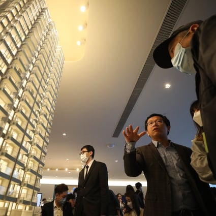 Prospective homebuyers and investors looking at units in the showroom for the After the Rain project in Yuen Long on March 18. Photo: Xiaomei Chen