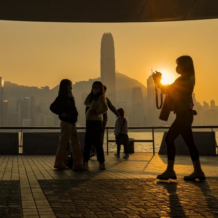 People visiting the Tsim Sha Tsui waterfront at sunset in December. Photo: Jelly Tse