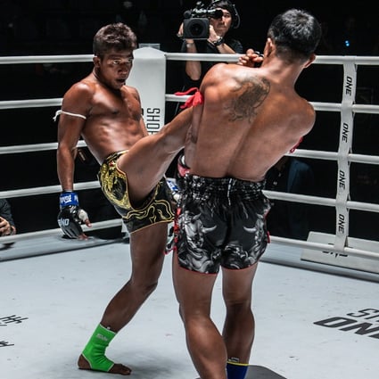 Thailand’s Theptaksin Sor Sornsing lands a kick on Yodkritsada Sor Sommai. Photos: ONE Championship. 