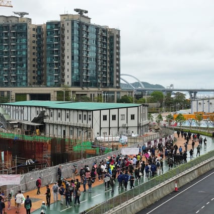 Protesters march in wet weather in Tseung Kwan O to voice their opposition against reclamation plans and the building of refuse facilities on such land. Photo: Elson Li
