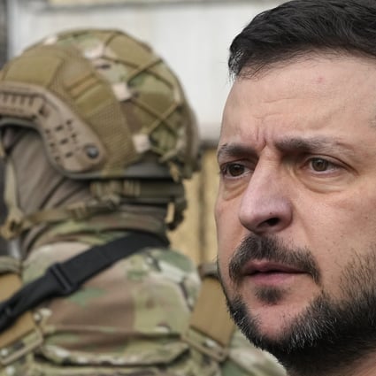 Ukraine’s President Volodymyr Zelensky visiting a missile-damaged area in Zaporizhzhia, Ukraine. Photo: AP
