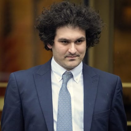 FTX founder Sam Bankman-Fried leaves a federal courthouse in New York on February 16. He is accused in a new indictment of paying a US$40 million bribe to unlock frozen crypto in China. Photo: AP