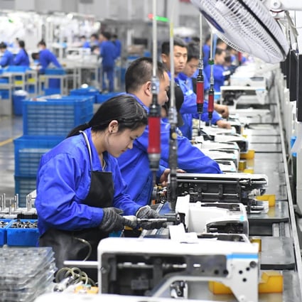 China’s official manufacturing purchasing managers’ index (PMI) fell to 51.9 in March from 52.6 in February. Photo: Xinhua