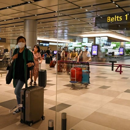 Passengers arrive at Changi Airport’s Terminal 4 in Singapore. File photo: AFP