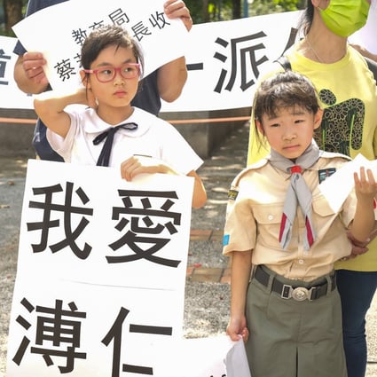 Students and parents from Po Yan Oblate Primary School gather on Saturday to petition education authorities not to axe the campus’ Primary One class. Photo: Handout