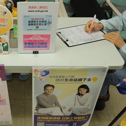 People register for the organ donor scheme at a booth in Hong Kong’s Queen Elizabeth Hospital on May 23. For cross-border cooperation to succeed, people must trust that the scheme is accountable. Photo: Jelly Tse