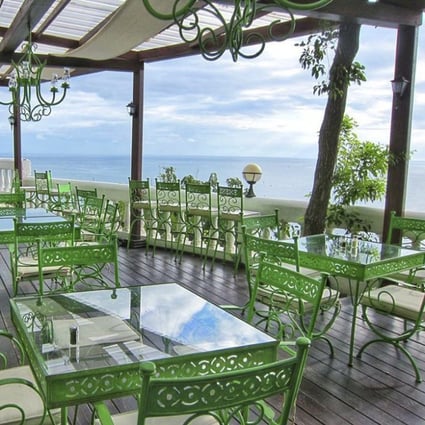 Government payouts, supposed to fight climate change, have been given to hotels, chocolate and gelato stores, a romantic film, and a coal power plant. Pictured: the refurbished Basilik Restaurant at Habitation Jouissant in Haiti, one of the beneficiaries of such payouts. Photo: Habitation Jouissant
