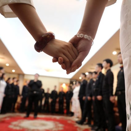 A Beijing-based choir comprising members of the LGBT community prepares backstage before a concert during Shanghai’s Pride celebrations in June 2018. Photo: Simon Song
