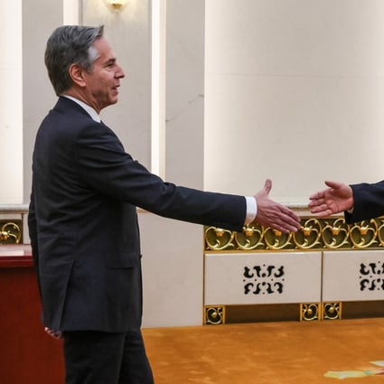 Chinese President Xi Jinping (right) greets US Secretary of State Antony Blinken in the Great Hall of the People in Beijing on Monday. Photo: Reuters