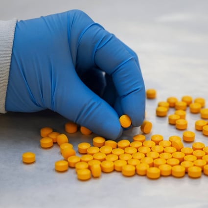 A US Drug Enforcement Administration chemist checks confiscated pills containing fentanyl at a laboratory in New York. Future discussions among Chinese and Americans concerned about the state of relations should make opioids – fentanyl in particular – a focus. Photo: AFP