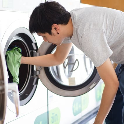 Doing laundry is easy today compared to pre-modern China. Low-wash advocates, mainly men, who hate doing theirs would have hated pounding their clothes with sticks and using primitive detergents even more. Photo: Getty Images
