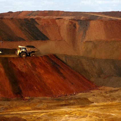 A truck carries iron ore at a mine in Western Australia. Iron ore is a key Australian export to China. File photo: Reuters