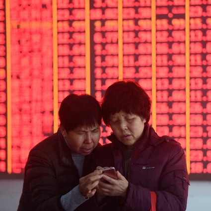 Investors are seen at a stock exchange in Hangzhou, in east China’s Zhejiang province. Chinese shares have surged to become the world’s best performers this year. Photo: Xinhua