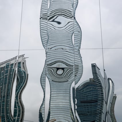 The International Chamber of Commerce is reflected in a wall of the West Kowloon Cultural District’s M+ Pavilion. Picture: Sam Tsang