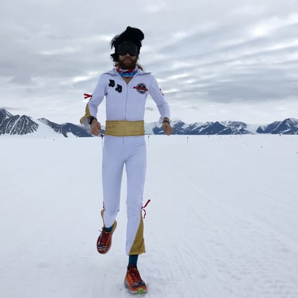 Michael Wardian runs in Antarctica dress as Elvis, one of many ways he injects fun into racing. Photo: Jennifer Wardian