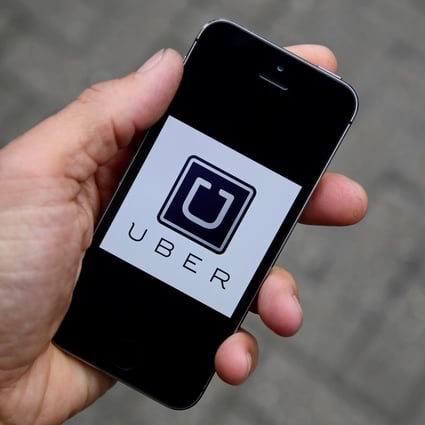 Wong Yiu-long took up part-time driving with Uber to help repay debts. Photo: Reuters