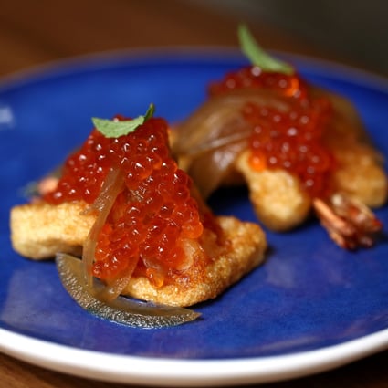 Shrimp toast with house pickled onions and salmon roe at Roots restaurant in Wan Chai. Photo: Jonathan Wong