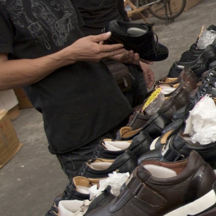 Shoe shop customer in Fujian province discovered the saleswoman thought he lacked decorum. Photo: Handout