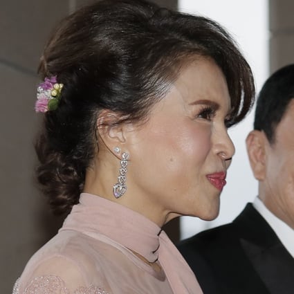 Former Thailand Prime Minister Thaksin Shinawatra welcomes Princess Ubolratana of Thailand as they arrive for the wedding of Thaksin's youngest daughter Paetongtarn "Ing" Shinawatra at a hotel in Hong Kong. Photo: AP