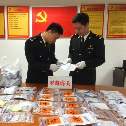 Customs officials in Shenzhen discovered 142 blood samples in a backpack carried by a 12-year-old girl. Photo: Luohu Port
