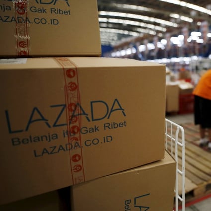 Employees at online retailer Lazada fill orders at the company's warehouse in Jakarta, Indonesia. Photo: Reuters