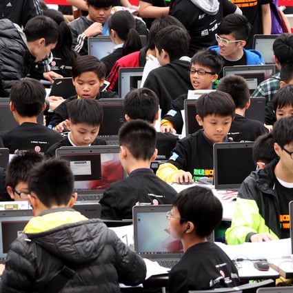Around 1,000 young coders attempt to set a new world record of “The Most Youngsters Perform Coding” in Hong Kong, 2015. Photo: SCMP