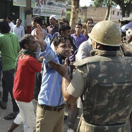 Residents argue with police in the wake of 2013’s deadly Muzaffarnagar riots. Photo: AP