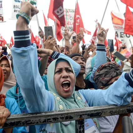 Indonesians at a campaign rally on the resort island of Bali on March 26. Photo: AFP