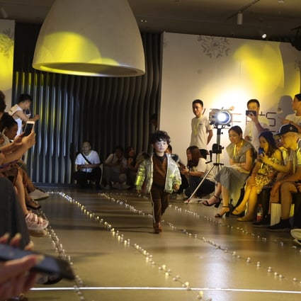 The catwalks of Zhili can be a road to riches for the children who prove a hit there. Photo: the paper.cn