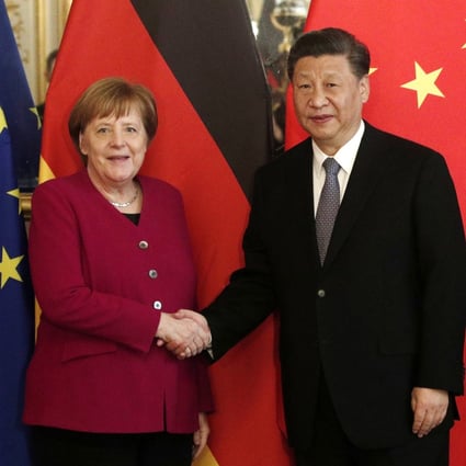 Xi Jinping and Angela Merkel at the Paris meeting. Photo: EPA-EFE