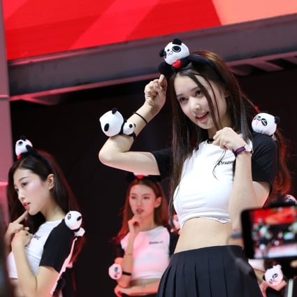 Showgirls promote Panda TV at China’s biggest gaming show. Photo: Zheping Huang