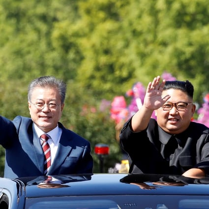 South Korean President Moon Jae-in and North Korea’s Kim Jong-un wave during a parade in Pyongyang on September 18, 2018. Photo: Reuters