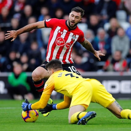 Southampton's Charlie Austin (10) in action with Manchester City's Ederson in December 2018. Photo: Reuters