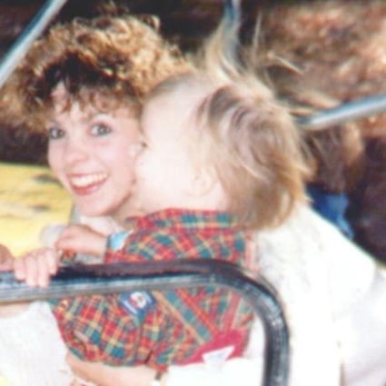 A photo of Bonnie Haim and her son, Aaron, on a merry-go-round. Photo: Facebook/Bonnie Haim's family